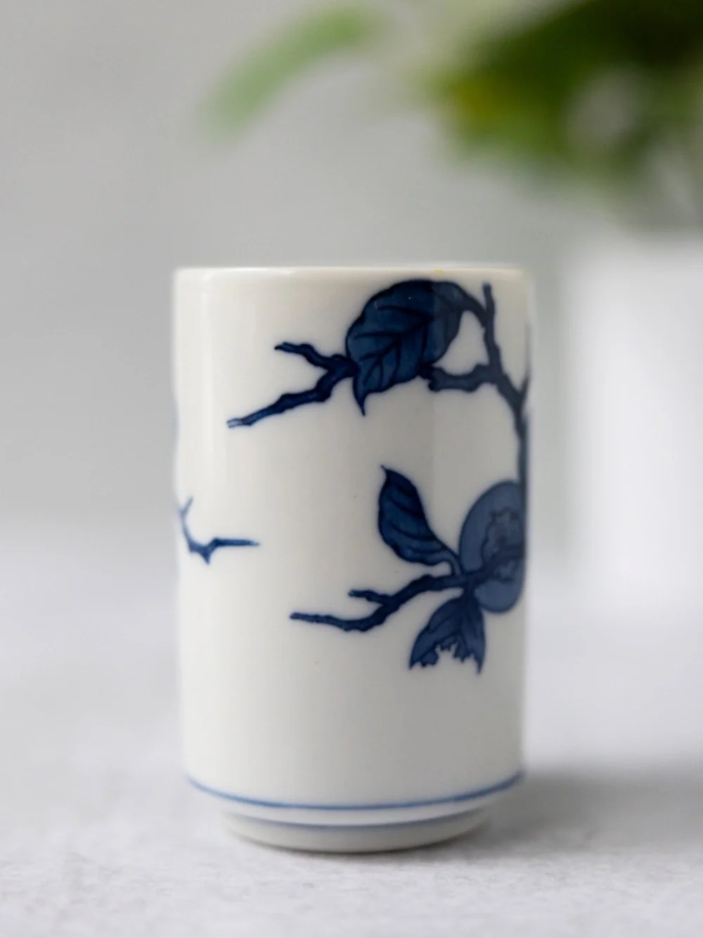 Vintage Otagiri blue white ceramic persimmon tea cup or small vase 3 3/8
